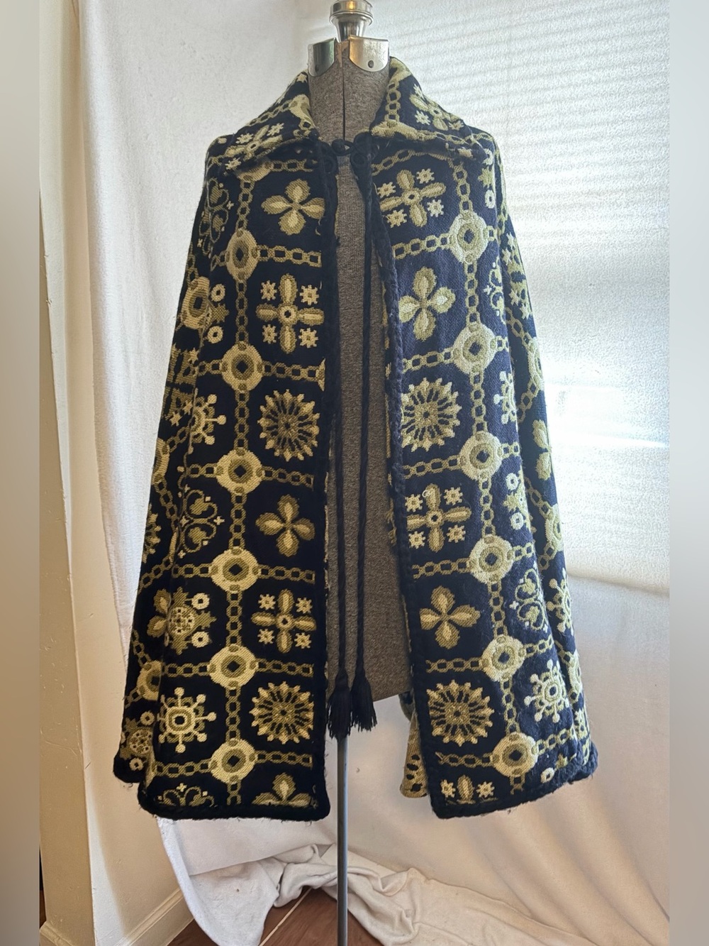 Vintage 70s tapestry knit cape with tassels and arm slits